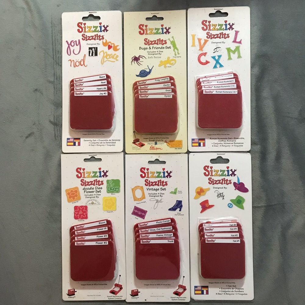 Sizzix sizzlits sets (doodle flowers, vintage, serenity, numeral, bugs, hats)